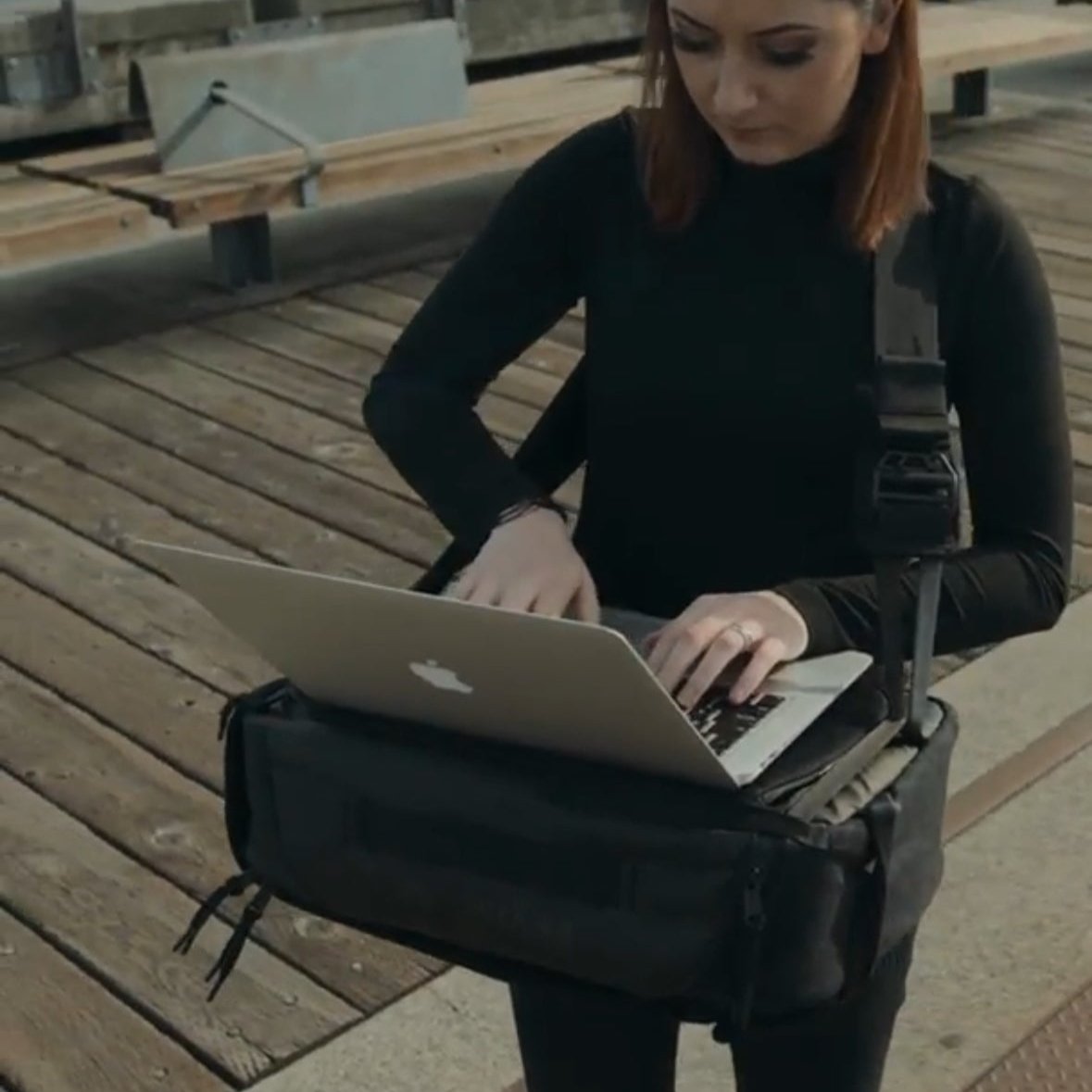 Using a laptop on the top shelf camera bag